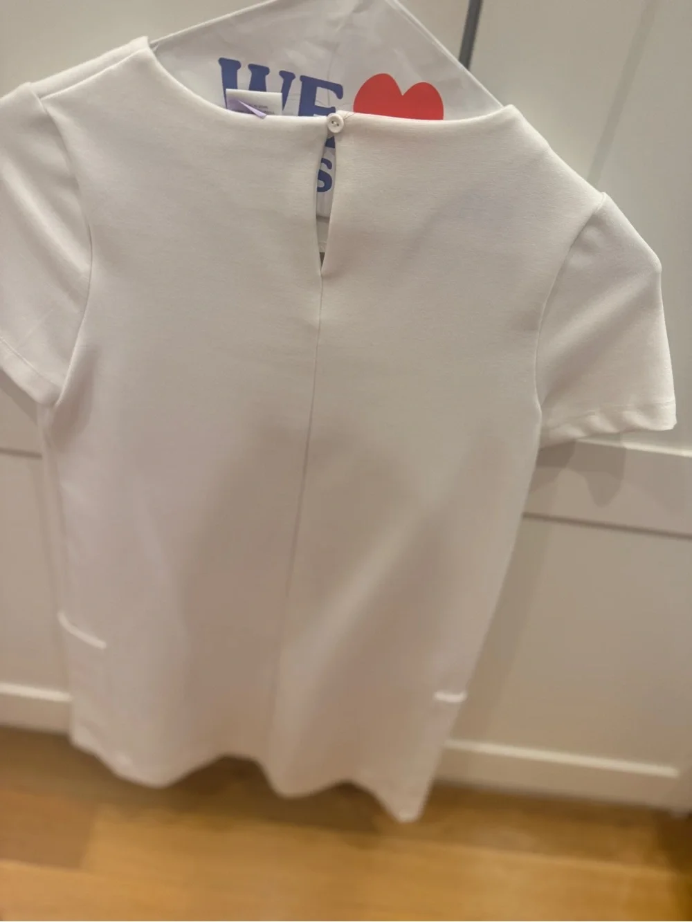 Zara White Short-Sleeve Dress Top with Black Flower Appliqué